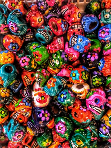 Candy Day of the Dead Ceramic Skulls Tiny bead sizes Day of the Dead skulls at the artisanal market in Mexico City with vibrant colors. day of the dead photos stock pictures, royalty-free photos & images