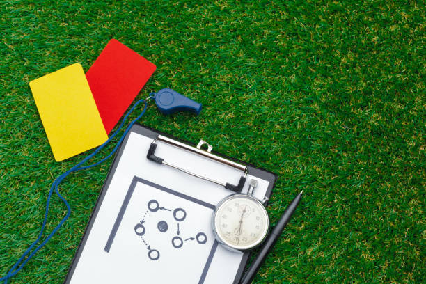 two penalty cards and a whistle for the referee - soccer soccer field artificial turf man made material imagens e fotografias de stock