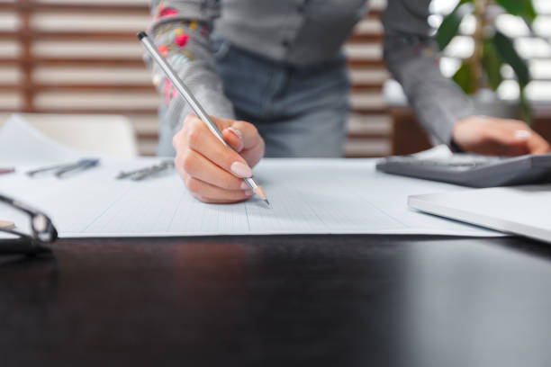 istock Female architect at work in an office 1026461350