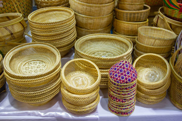 istock Closeup Community Products Weaving A Wicker Basket By Handmade 1026461850