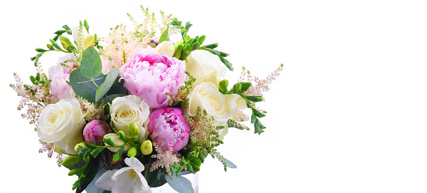 Bunch of beautiful multicolored eustoma flowers on neutral light background, space for text, invitation concept