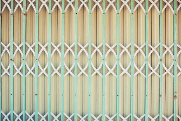istock Yellow color metal sheet material roller gate or door 1026469344