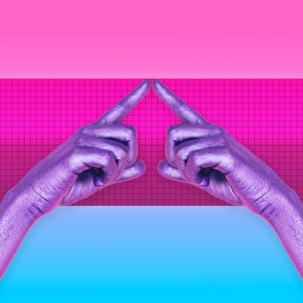istock two painted hands point fingers to somewhere. 1026469932