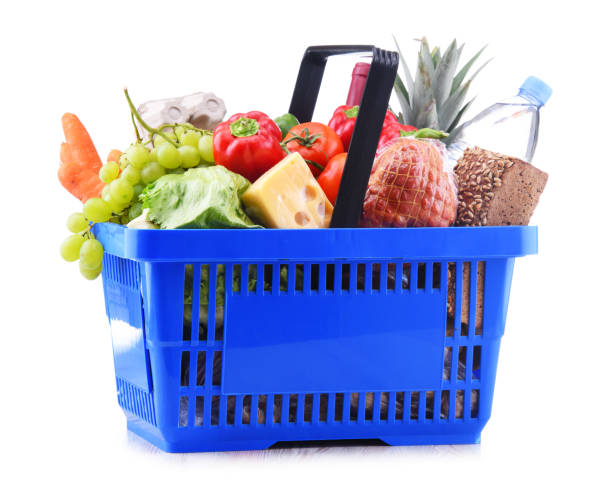 istock Plastic shopping basket with assorted grocery products 1026472506