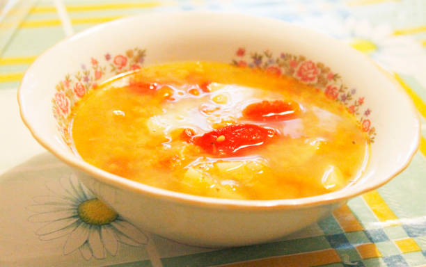 istock Bowl with a fresh soup on the tablecloth on the table 1026476322
