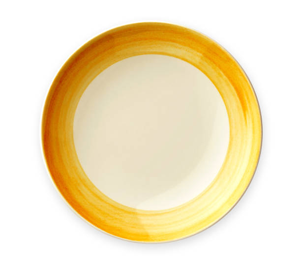 istock Empty plate with yellow pattern edge, Ceramic plate with spiral pattern in watercolor styles, View from above isolated on white background with clipping path 1026480694
