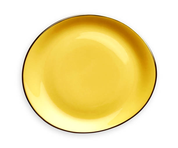istock Empty ceramics plates, Classic yellow plate, View from above isolated on white background with clipping path 1026481094