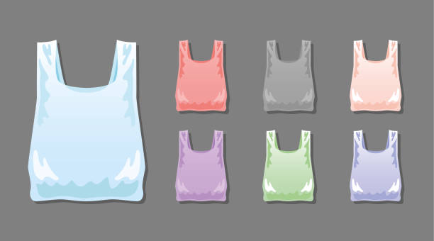 istock Coloured plastic bags set. Collection of disposable cellophane package, cartoon style. Blue, red, violet, black, pink, green colours. Vector illustration isolated. 1026481124