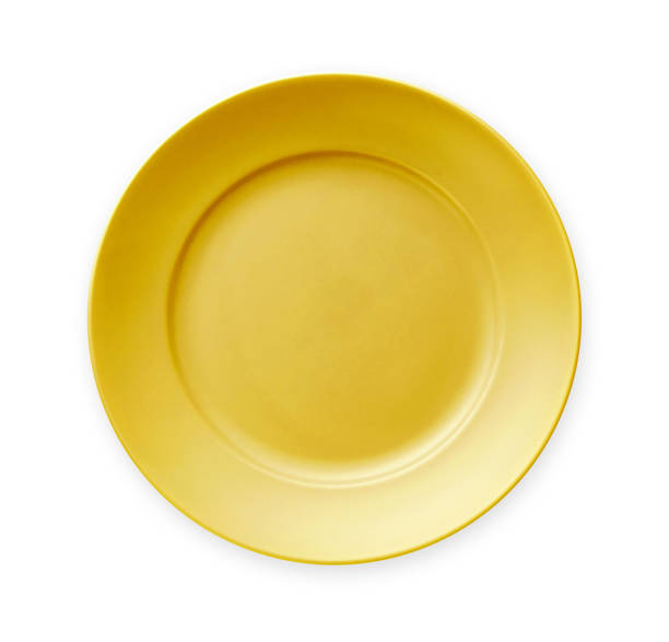 istock Empty ceramics plates, Classic yellow plate, View from above isolated on white background with clipping path 1026481446