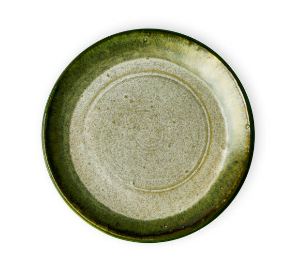 istock Green ceramic plate, Empty plate with granite texture, View from above isolated on white background with clipping path 1026483990