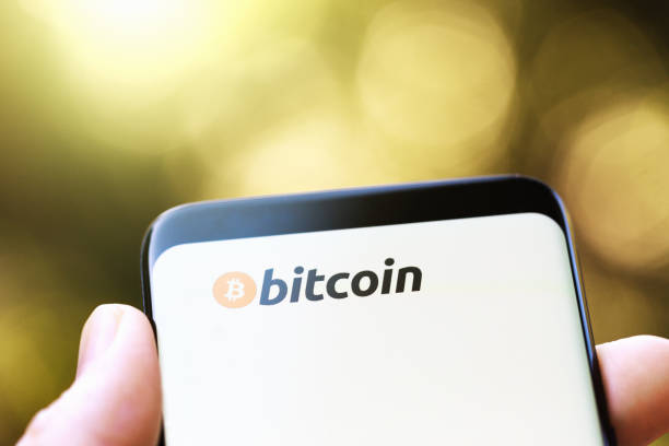 istock Bitcoin name and logo shown on mobile phone screen 1026485622
