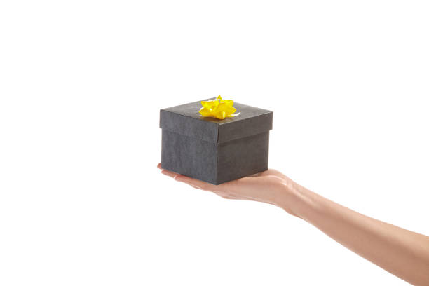 istock Woman hand holding gift box 1026485688