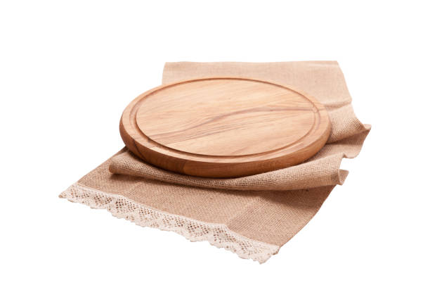 istock Napkin and board for pizza isolated on white. Canvas, dish towels on white background top view mock up. Selective focus. 1026488512