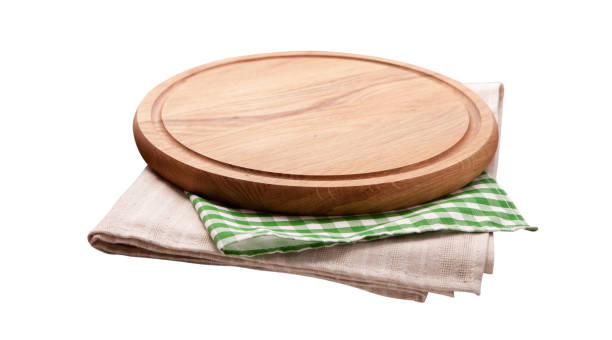 istock Board for pizza and tablecloth isolated on white. Canvas, dish towels on white background top view mock up. Selective focus. 1026488558