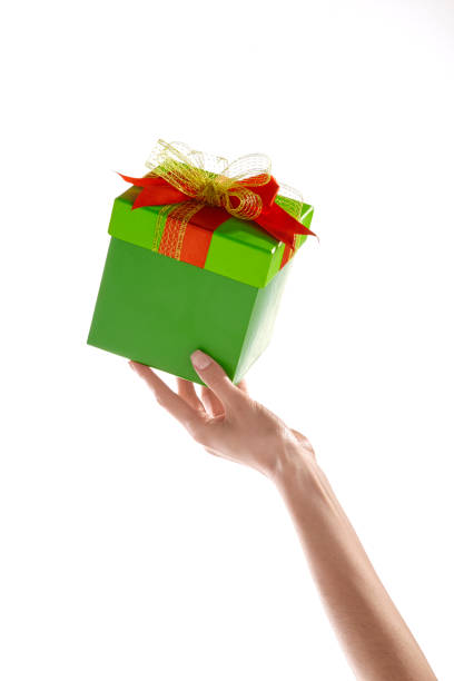 istock Woman hand holding gift box 1026489630