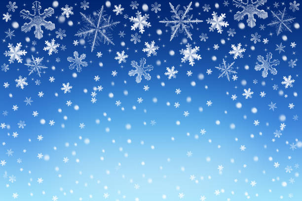 Blue Christmas snow sky background with white and silver snowflakes and stars. Abstract Winter holiday backdrop