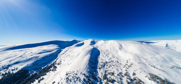 istock Aerial Flight Mountain Clouds Sunrise Beautiful Morning Peaks 1026499490