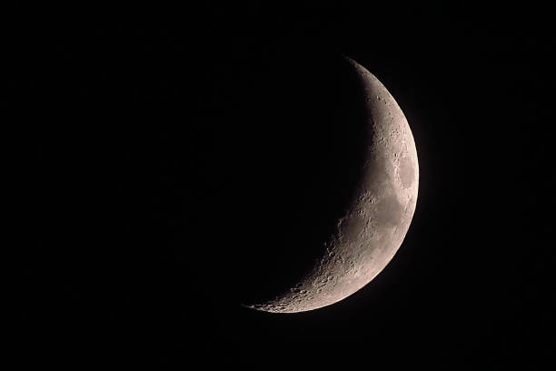 Part of the moon on black background Part of the moon on black background, moon month meal sliver stock pictures, royalty-free photos & images