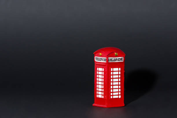 istock London phone booth on black background 1026508424