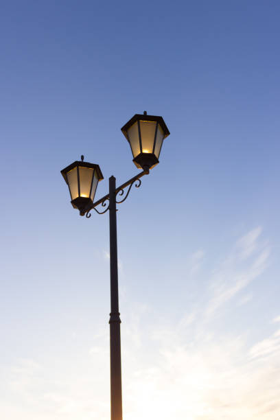 istock street light against the blue sky. vertical image 1026508488