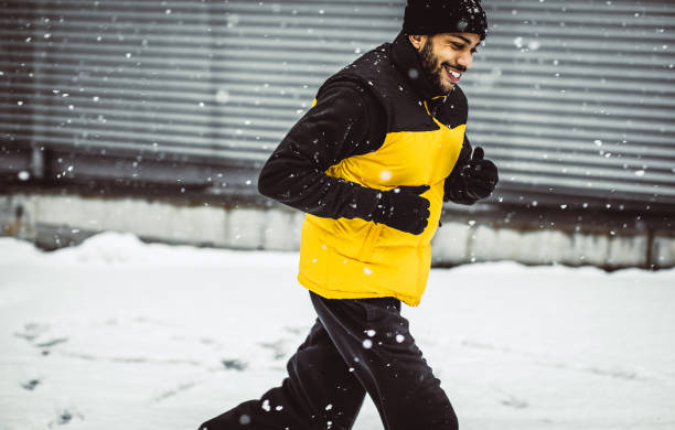 istock Young Man Exercising in Winter 1026508940