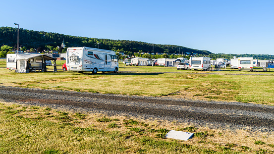 Granna, Sweden – July 2, 2018: Camping cite in the village with motorhomes and caravans on an ordinary summer morning.
