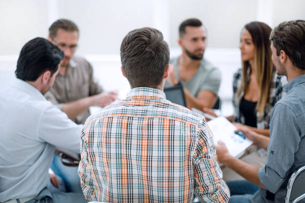 istock close up.business team discussing financial data 1026523282