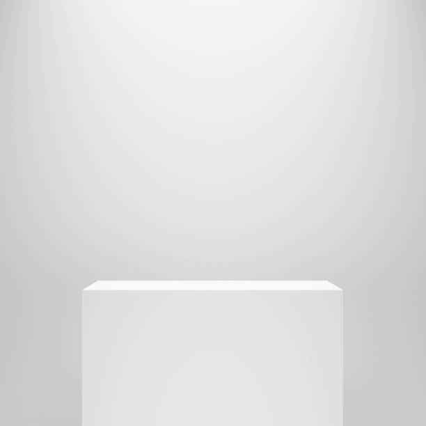 istock white blank empty rectangle pedestal template in front of white wall 1026534426