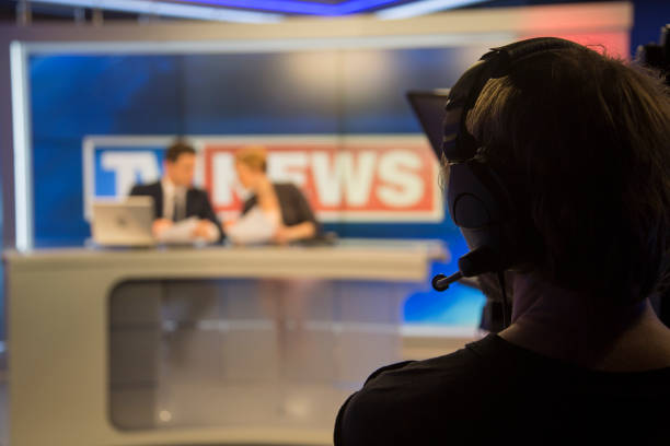 istock Tv news studio before live 1026540170