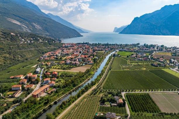 istock Aerial view on Nago Torbole city and Sarca River. 1026544316