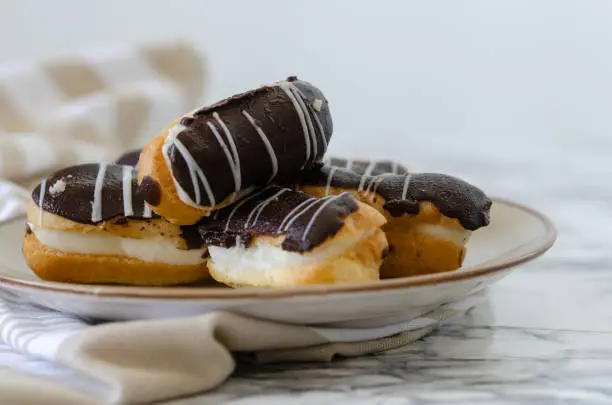 Traditional French dessert on a white plate. Empty space for design text template