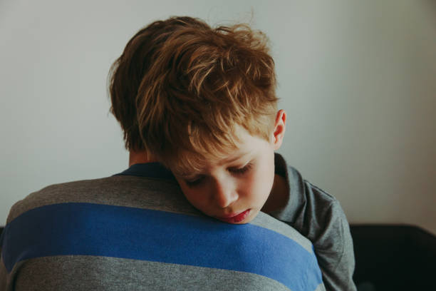 istock Father comforting sad child, parenting, sorrow concept 1026552042