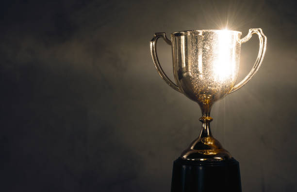 istock champion golden trophy placed on wooden table 1026555136