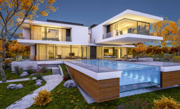 istock 3d rendering of modern cozy house by the river. Cool autumn evening with soft light. 1026556078