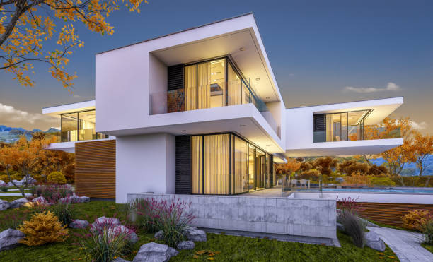 istock 3d rendering of modern cozy house by the river. Cool autumn evening with soft light. 1026556184