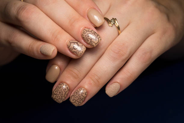 istock Women's hands with a stylish manicure. 1026563530