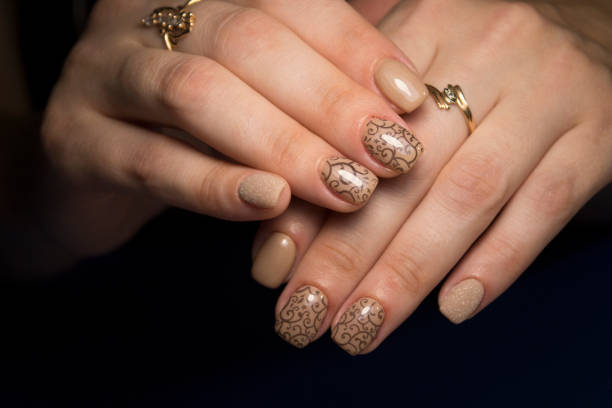 istock Manicured nails Nail Polish art design. 1026566322