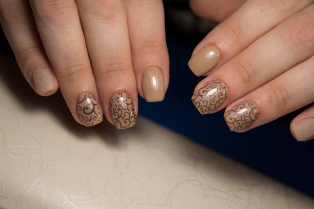 istock Women's hands with a stylish manicure. 1026566958