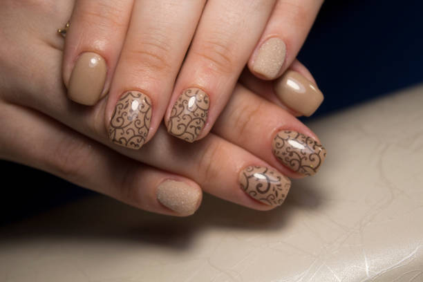 istock Women's hands with a stylish manicure. 1026566994
