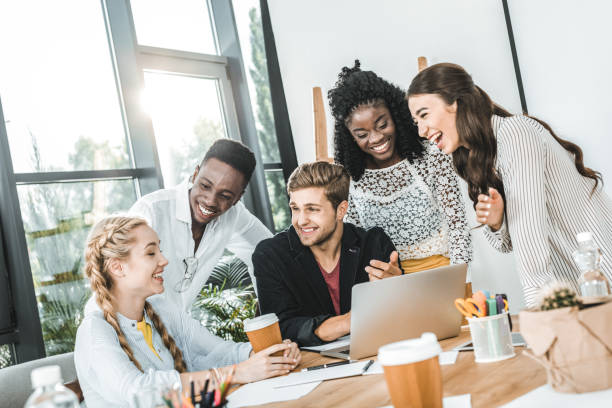 istock multiethnic young business team working on laptop together at workplace in office 1026577298