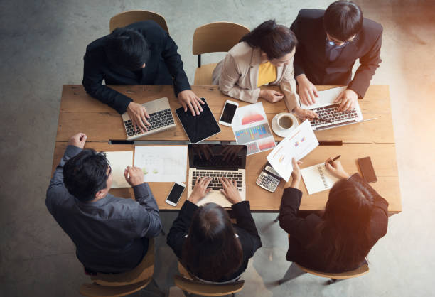 istock Business people meeting teamwork on meeting table in a modern office 1026577752