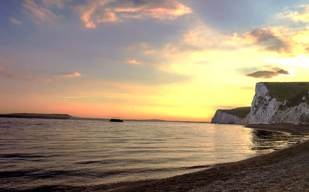 istock Durdle door - sunset - turist place 1026586730