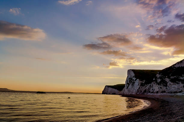 istock Durdle door - sunset - turist place 1026586828