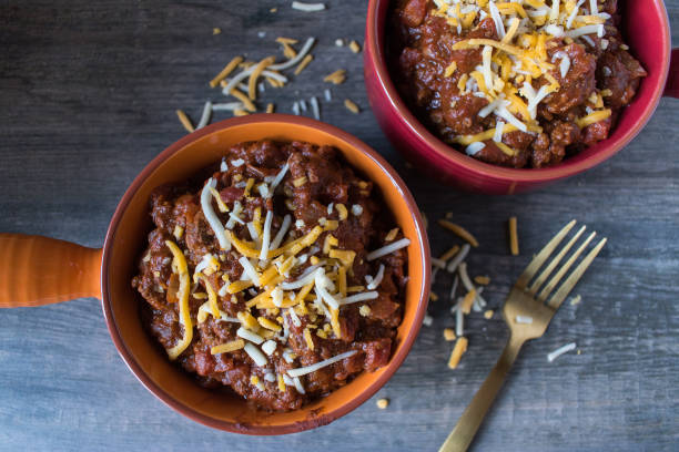 istock homemade chili in bowls 1026587018