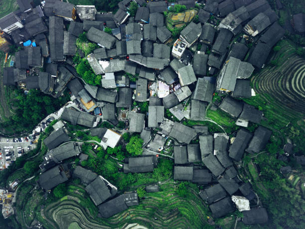 directly above drone view on village in the Longsheng rice terrace fields