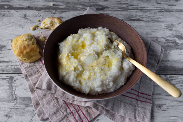 southern grits with biscuits stock photo