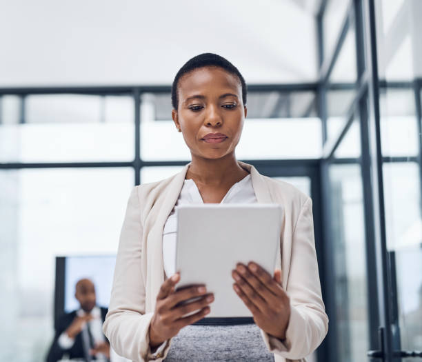 istock Breaking away to check up on her emails 1026593956