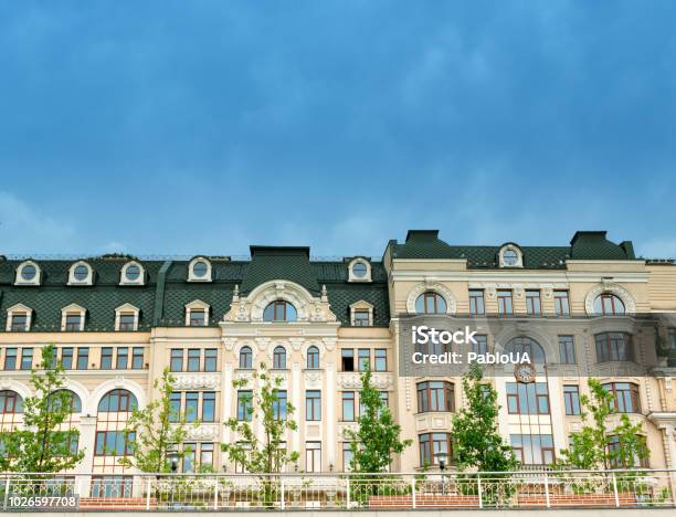Front Of Modern Buildings With Terrace Benches And Trees Stock Photo - Download Image Now