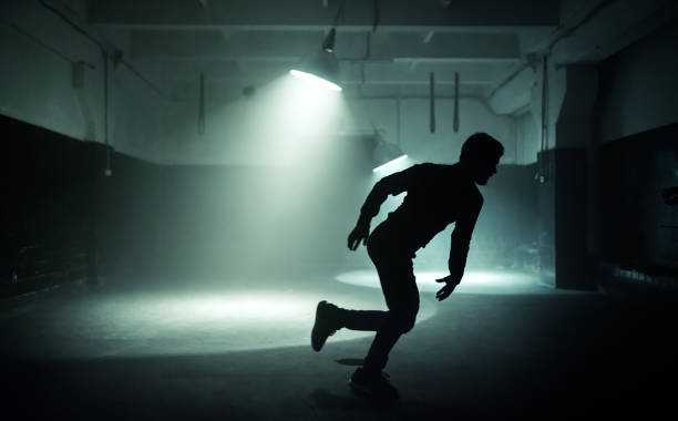 istock Male Dancer Is Running. Silhouette Backlit 1026602960