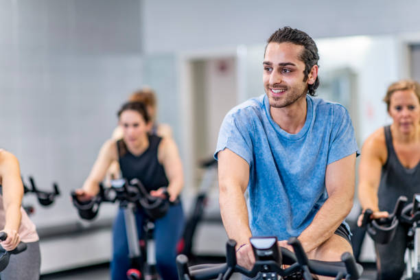 Exercise Bike Rider 1,000+ Exercise Bike Class Stock Photos, Pictures & Royalty-Free Images ...